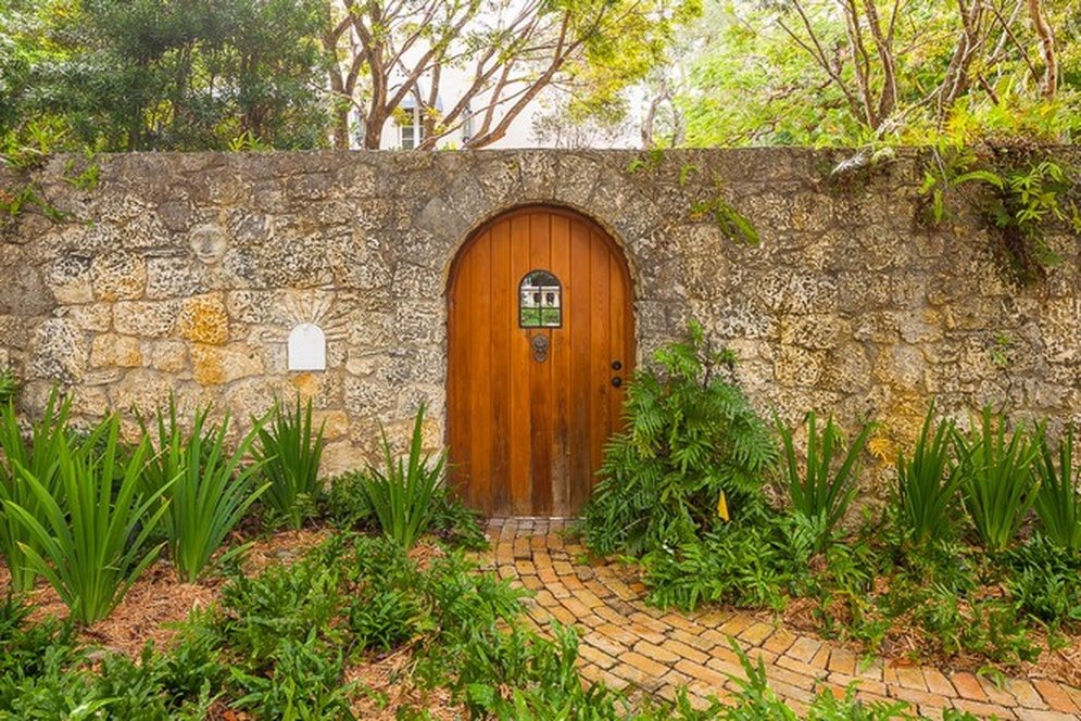 Ideal Coconut Grove Classic, With Coral Rock Wall, is Looking for $2.35 Million Image