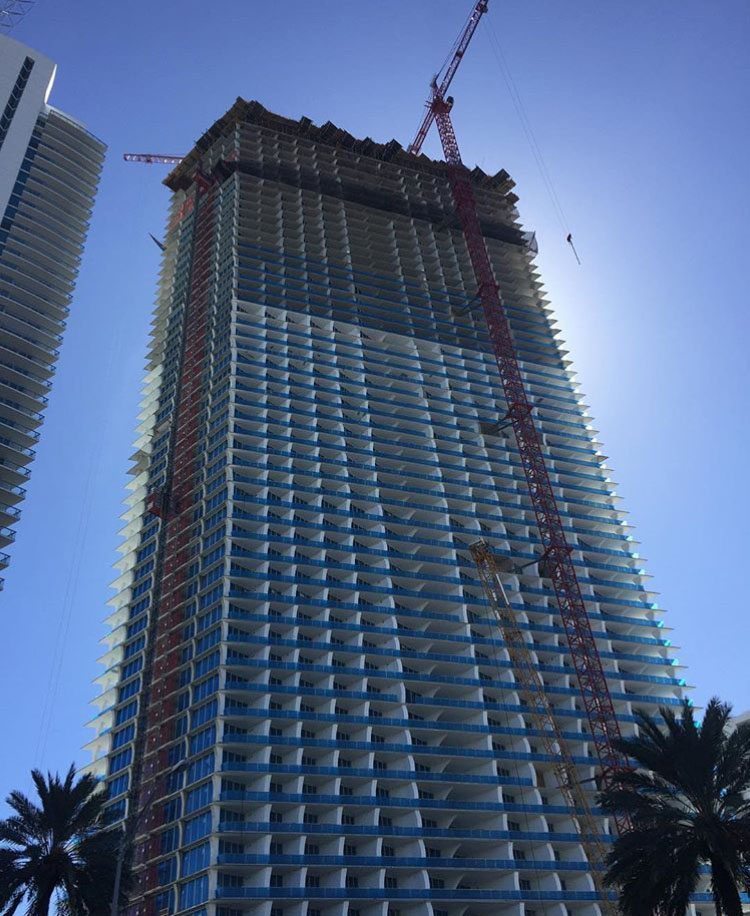 Jade Signature Tops Off at 636 Feet Tall With 57 Floors Plus 3-Story Underground Parking Garage Image